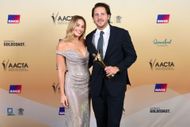 Margot Robbie and Tom Ackerley (Image via Getty)